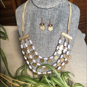 Gold and white statement necklace and earrings